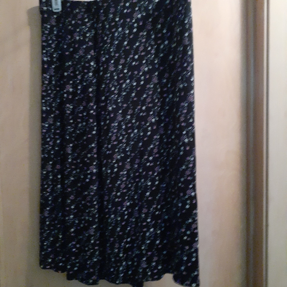Top & skirt black with small flowers.